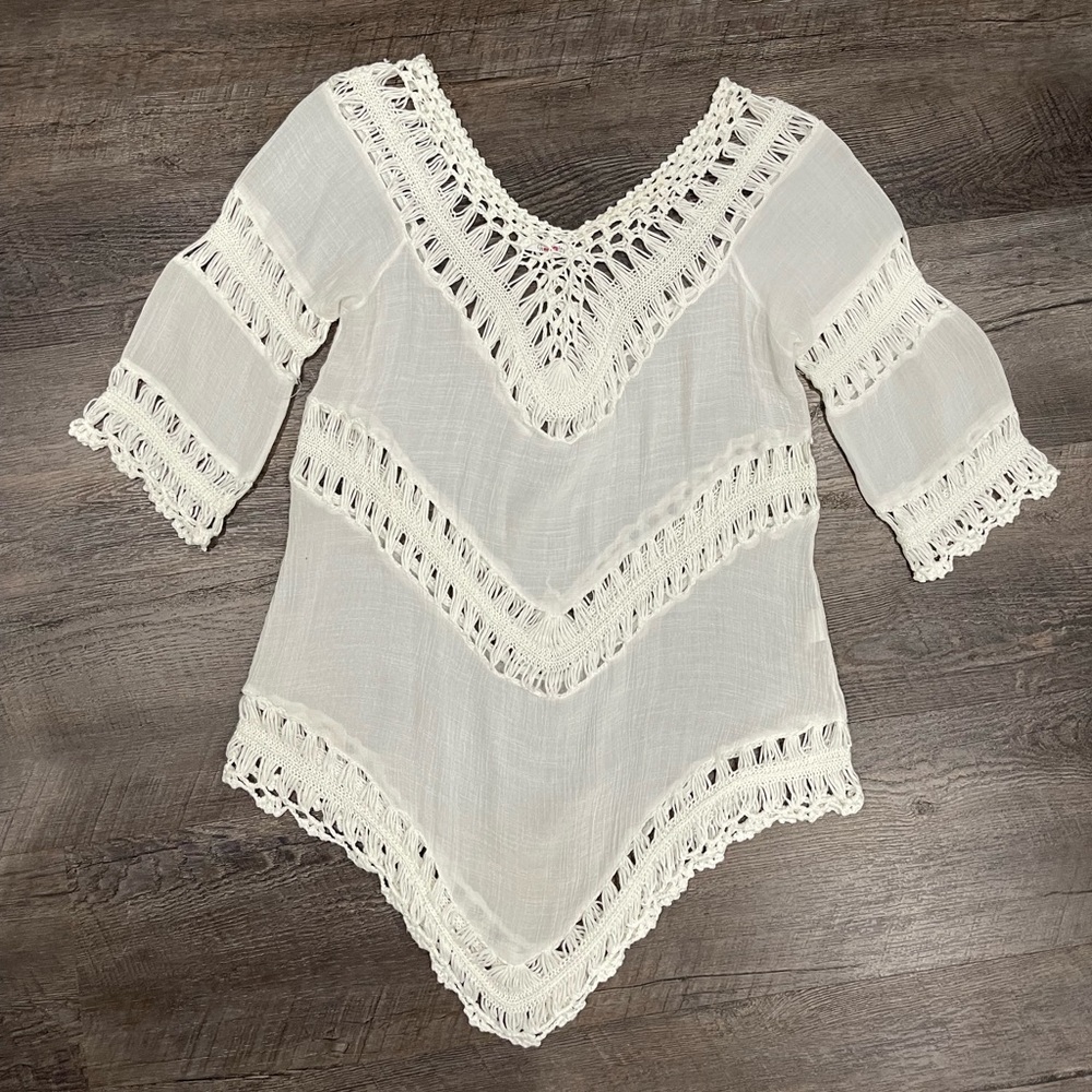 White crocheted beach cover up size small.